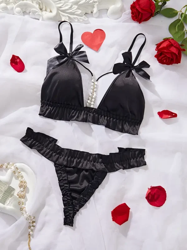 1d3d7b91-7bc7-487f-8c26-eed20bb8ff8f Black Satin Ruffle Bralette & Pearl-Chain Thong Lingerie Set