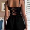 d8cee4b6-e73f-4975-9d29-6e60e3729f00 Women’s Black Ribbed Cami & Ruffle-Trim Shorts Pajama Set